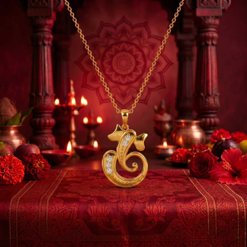 Gold necklace with a decorative pendant on a red background with floral elements