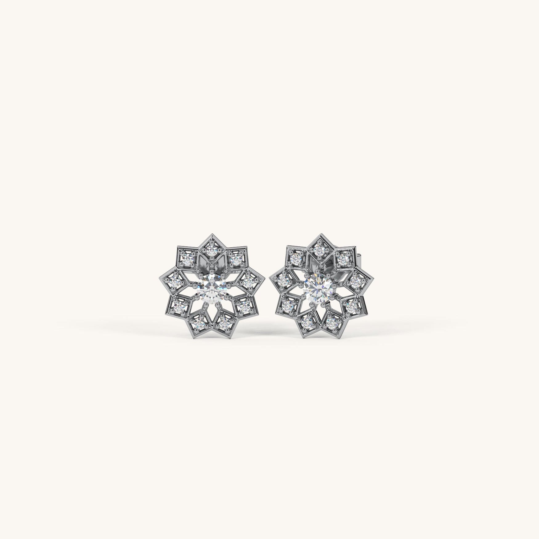 Pair of diamond earrings on a white background