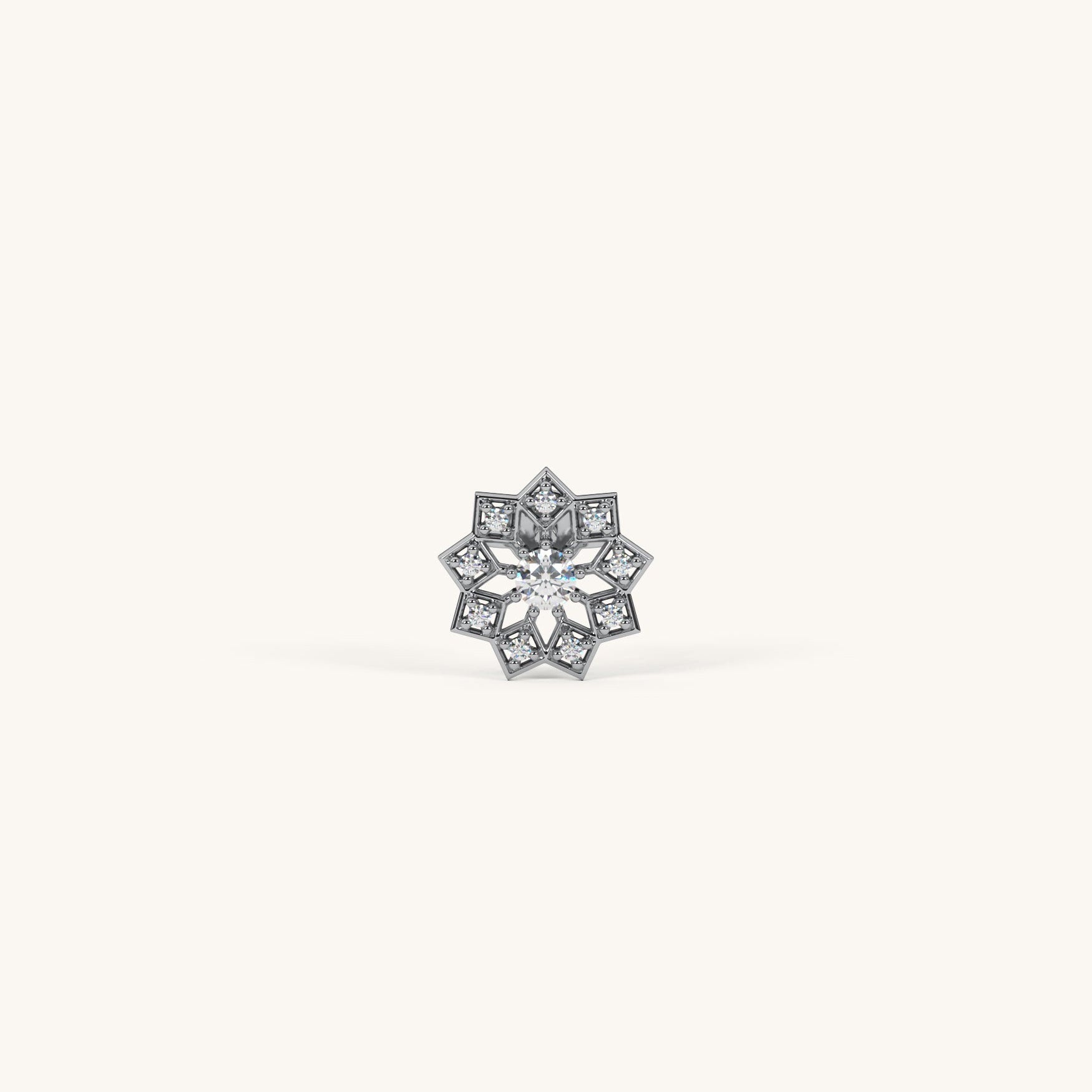 Silver flower-shaped earring on a white background
