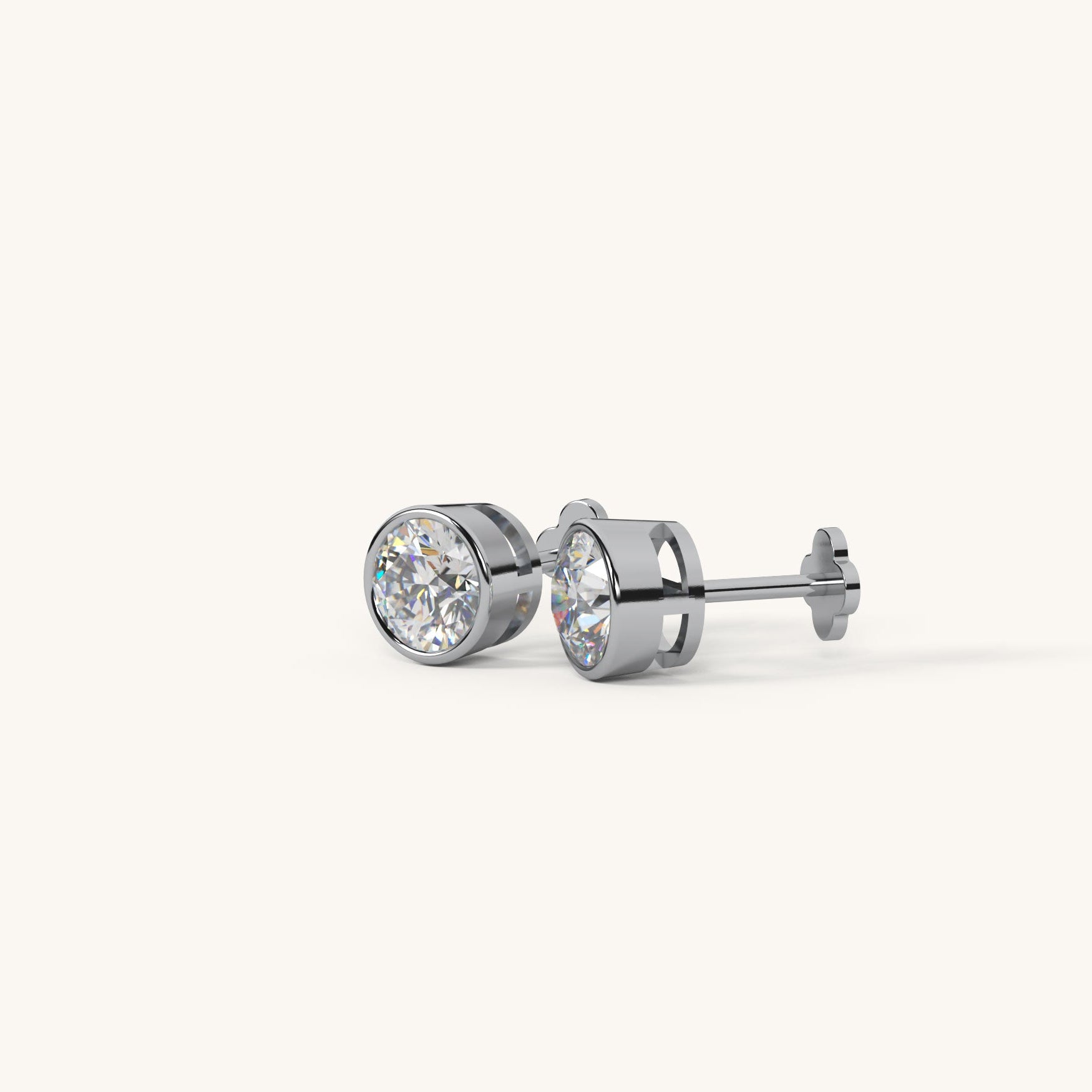 Diamond stud earrings on a white background
